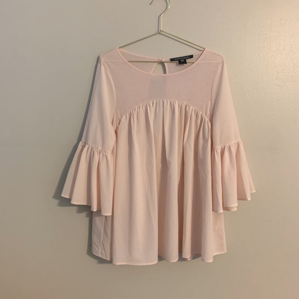 Babydoll styled blouse.